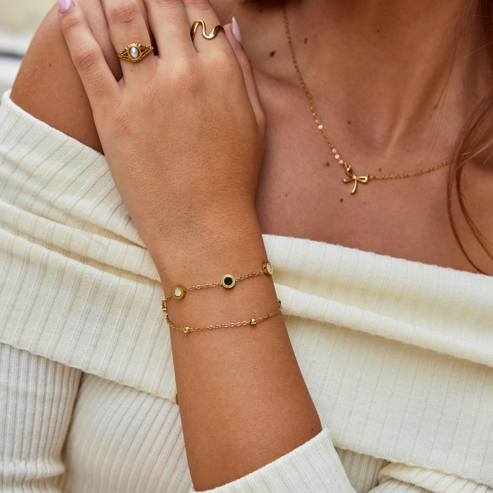 Pulsera de ónix y piedra blanca